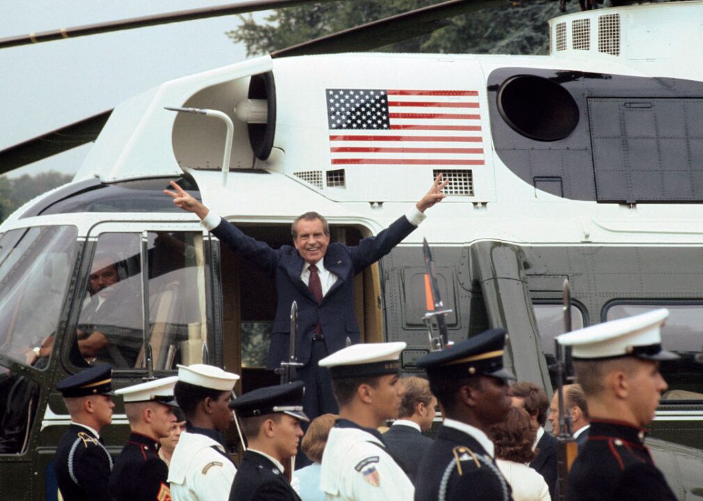 1974: Richard Nixon giving victory sign after resignation